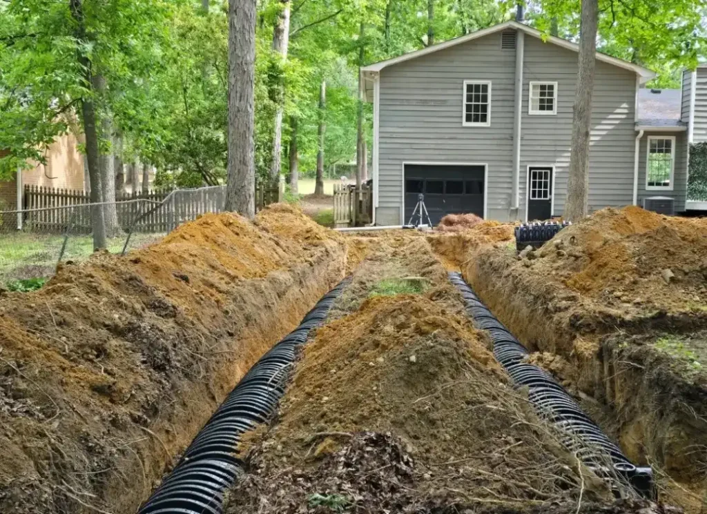 Trench with drainage pipes.